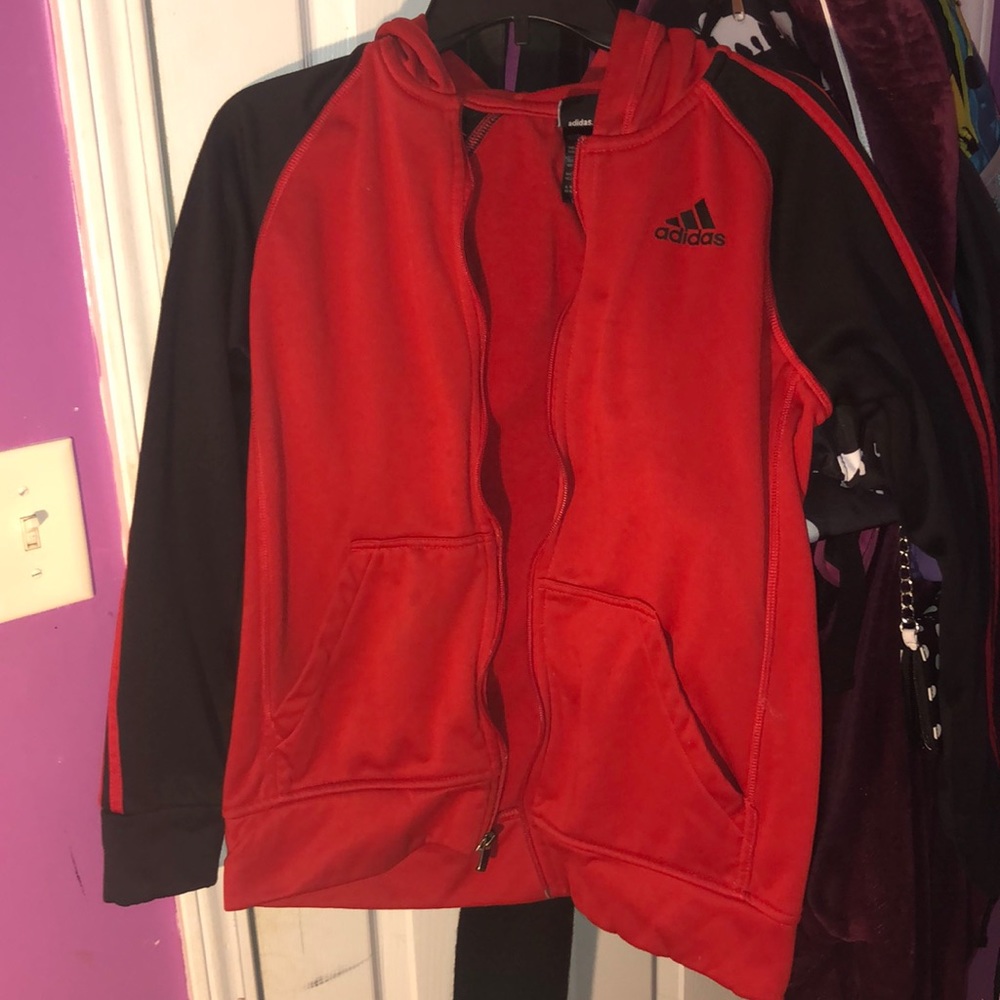 This is a red and black adidas jacket!!